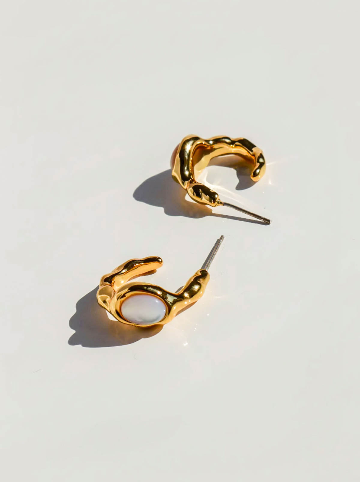 Gold Textured Irregular C Shaped Hoop Earrings with Black/ White Acetate Beads