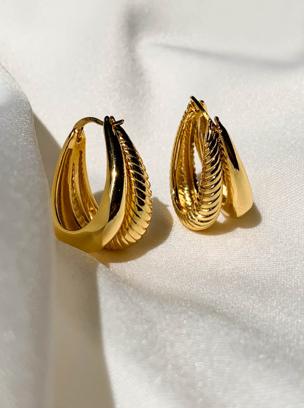 Gold Oval Twisted Hoop Earrings