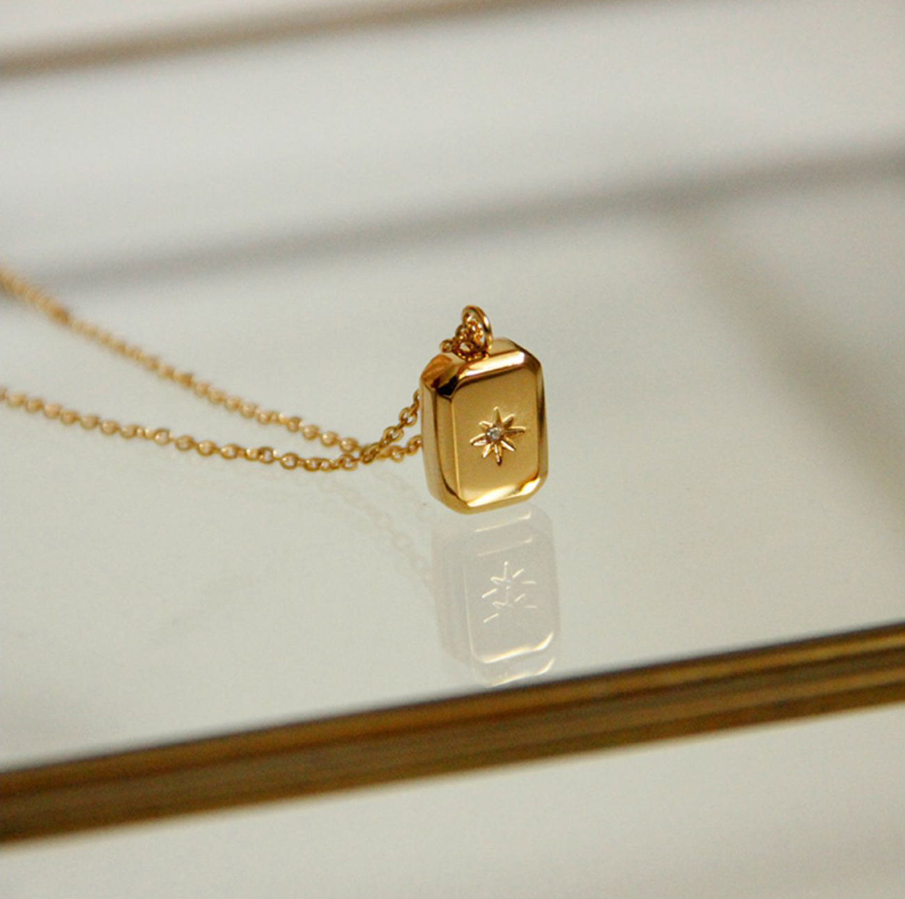 Gold Rectangular Charm Pendant Necklace with Star Accent