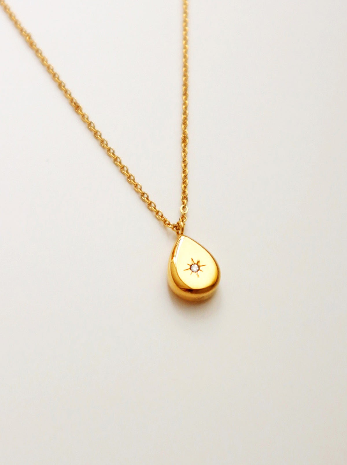 Gold Teardrop Pendant Necklace with Star Rhinestone Accent